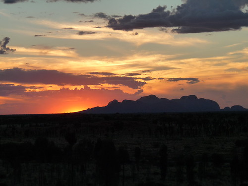 Sunsetting behind Kata Tjutu