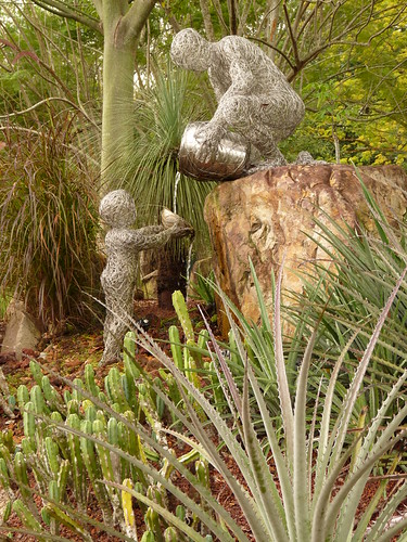 ‘Passing on knowledge’ sculpture at the botanic gardens