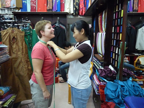 Claire getting measured for some outfits in HCMC