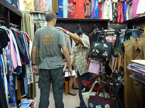 Ed getting measured for his suit in HCMC