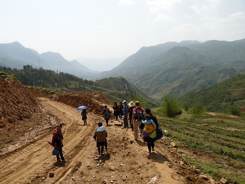 Walking to the villages, accompanied by Black H’mong ladies