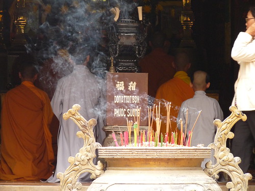 Monks praying at Tu Hieu Pagoda