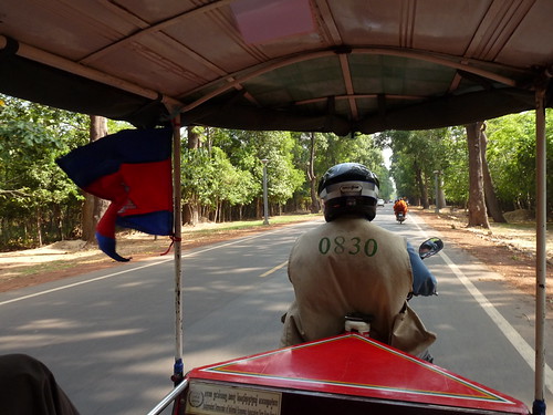 On our tuk-tuk on the way to the temples