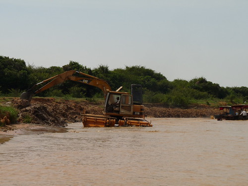 Digging a deeper channel along the river to Chong Khneas floating village