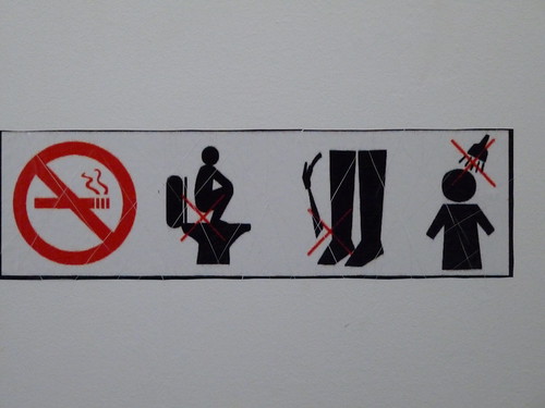 Warning sign in the toilets at Banteay Srei